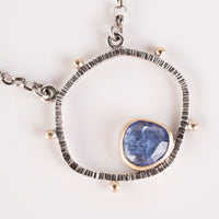 Saturn Tanzanite Pendant in Gold & Silver