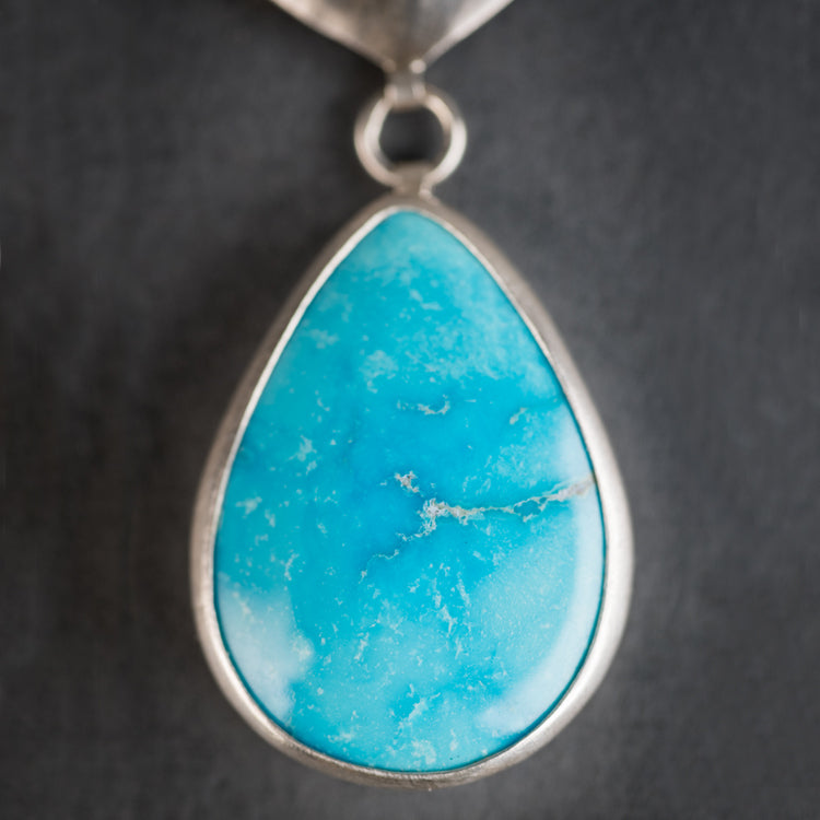 Ianthe Turquoise Shield w/ Dangle in Silver