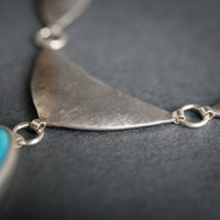 Ianthe Turquoise Shield w/ Dangle in Silver
