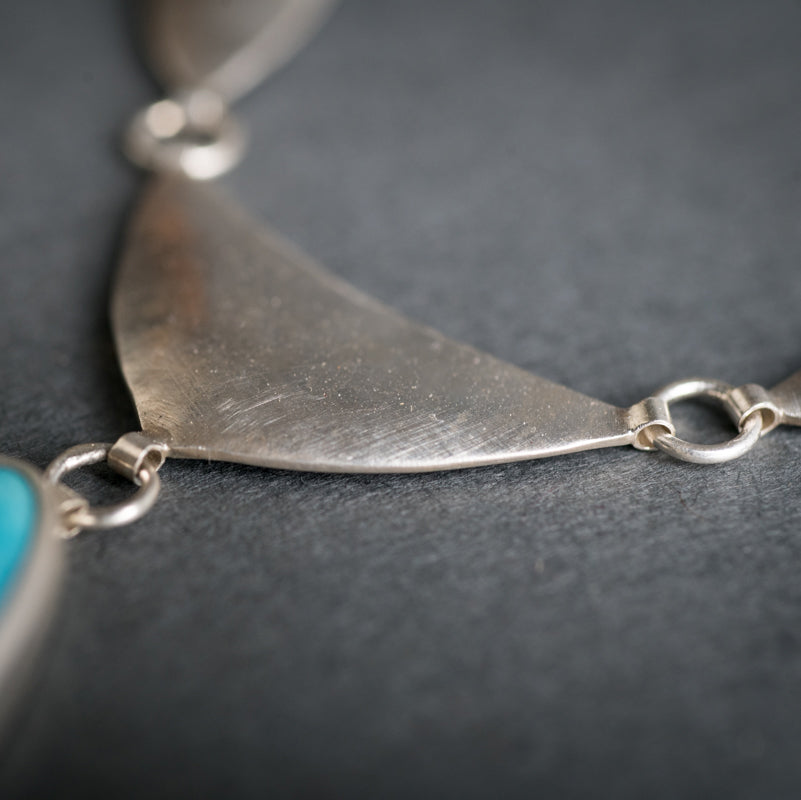 Ianthe Turquoise Shield w/ Dangle in Silver